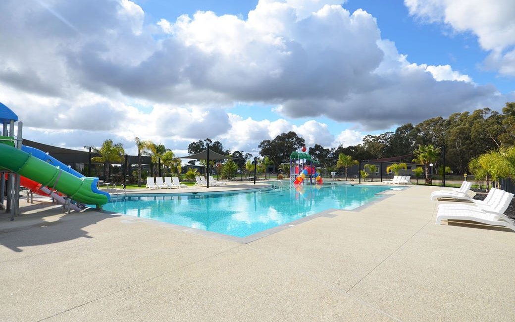 The 20ha site includes two resort-style swimming pools. Picture: realcommercial.com.au/for-sale
