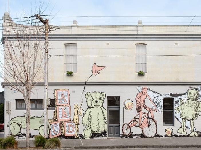 Fitzroy North: Playful mural adorns ex-toy manufacturer building turned into home and shopfront