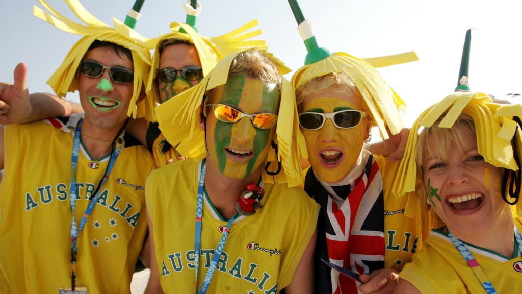 AUGUST 20, 2004: Australian fans on their way to Australia v Greece preliminiary game during 2004 Olympic Games in Athens, 20/08/04. Pic Jeff Darmanin. Softball / Fan