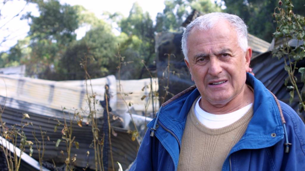 Chris Talihmanidis in front of what was his restaurant Chris' at Beacon Point Skenes Creek