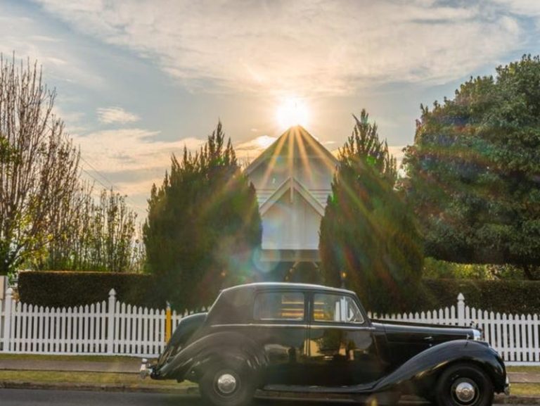 Miracle reno of daggy church which comes with its own Bentley