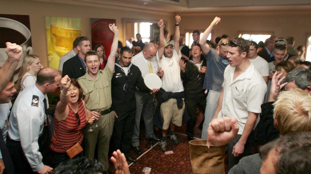 Patrons playing two-up game at Melbourne's Young & Jackson's hotel on Anzac Day.