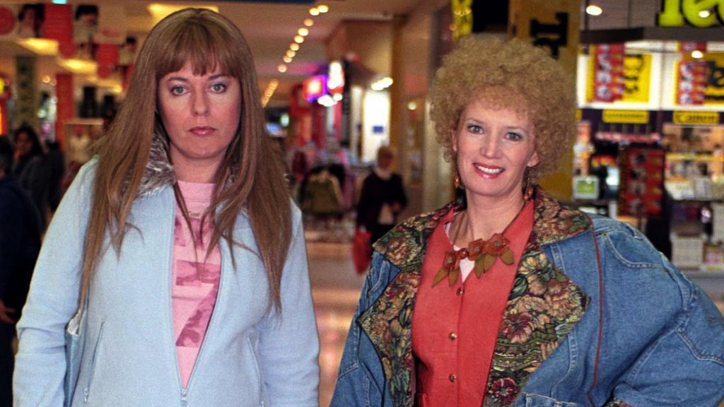 10/10/2003 FEATURES: 2003. Actors Gina Riley (L) and Jane Turner shopping at Fountain Gate in a scene from the TV show 'Kath and Kim'.