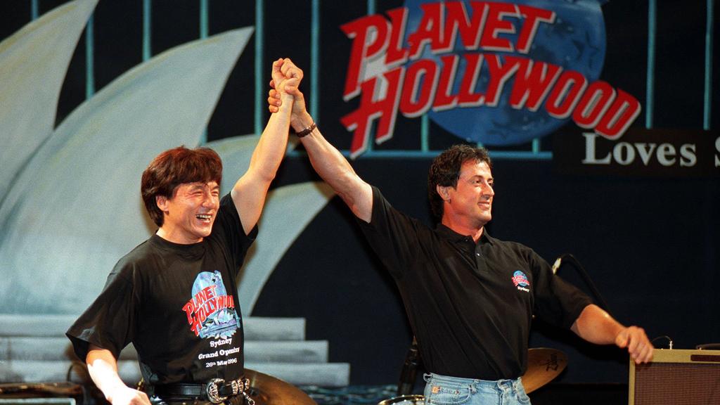 Actor Sylvester Stallone & Jackie Chan (L) at launch of Planet Hollywood Restaurant, George Street, Sydney 26/05/96 Chan/Actor Stallone/Actor New South Wales (NSW) / Restaurants